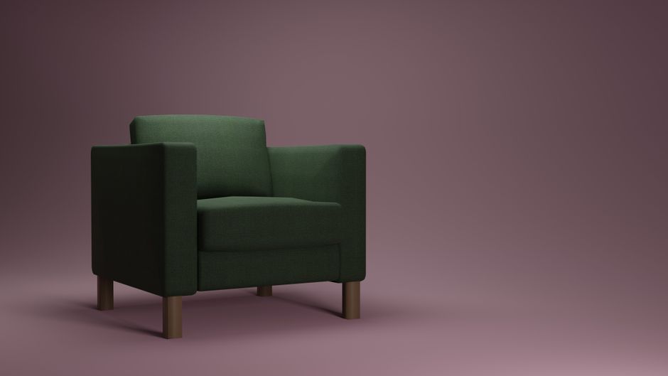 Green armchair in a minimalist setting, perfect for modern interior design inspirations.